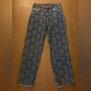 Cross Print Distressed Denim Jeans